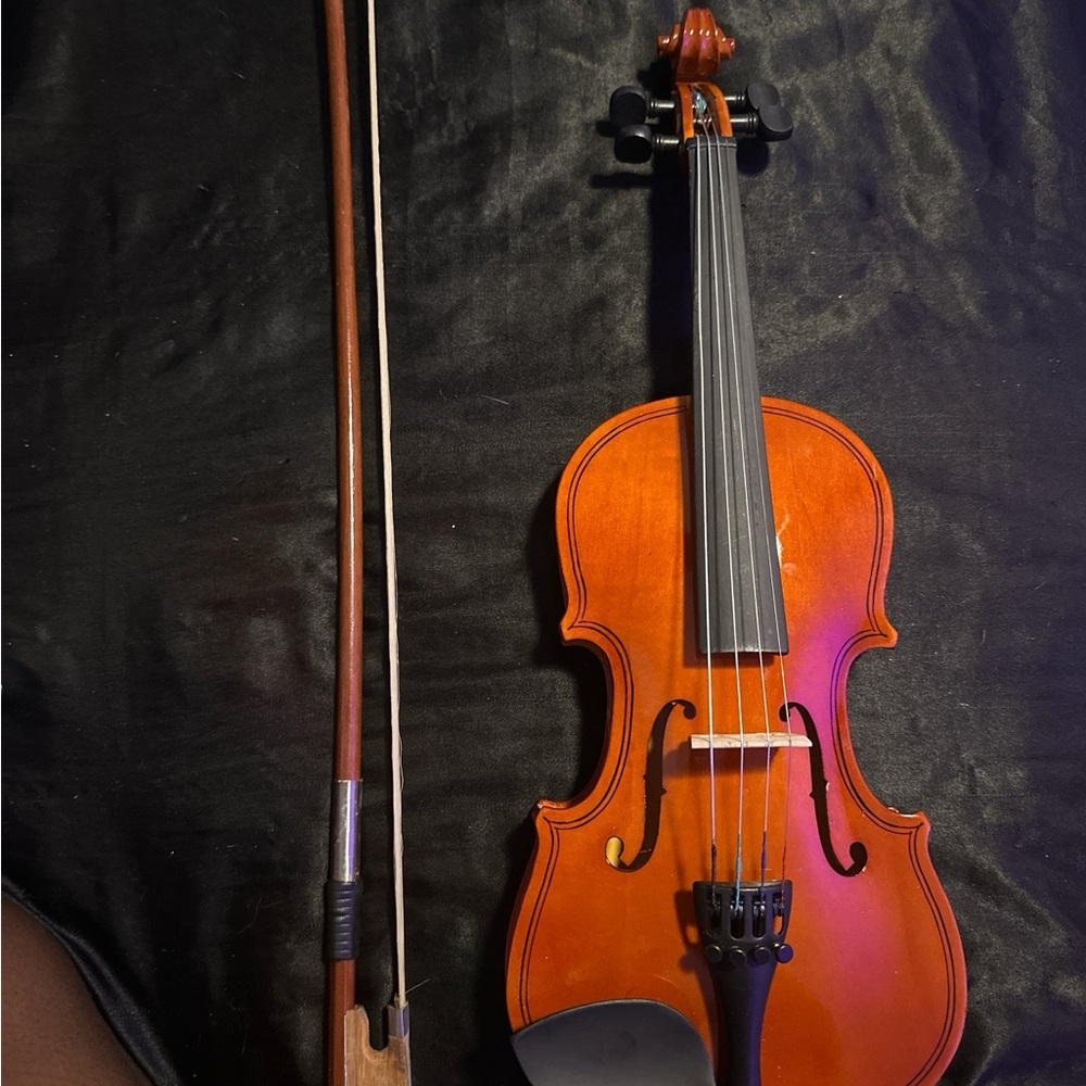 Elegant Orange Violin with Bow